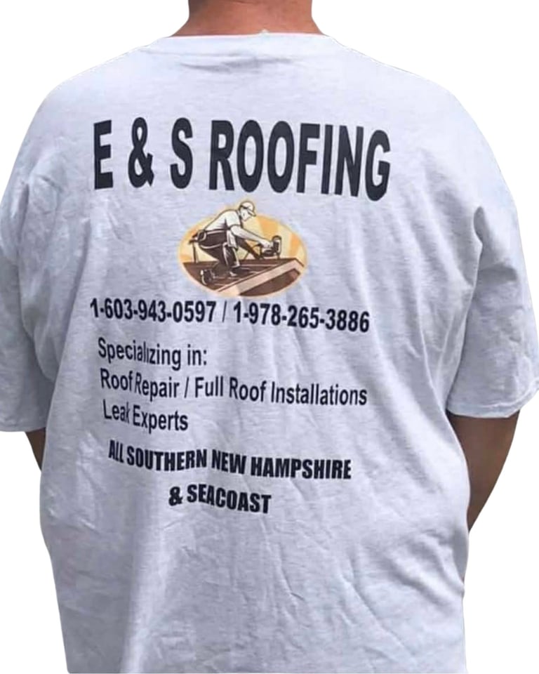 Person wearing light blue E and S Roofing company t-shirt