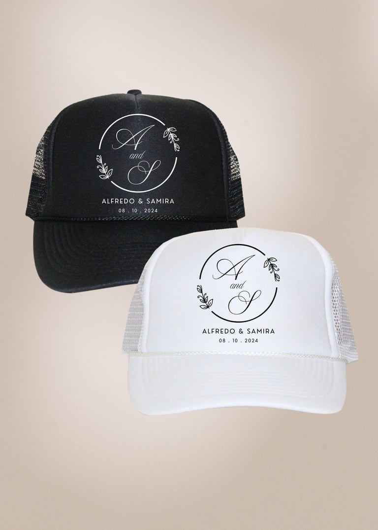Two mesh trucker hats, one black and one white, with matching monogram design reading Alfredo & Samira 28-10-2024