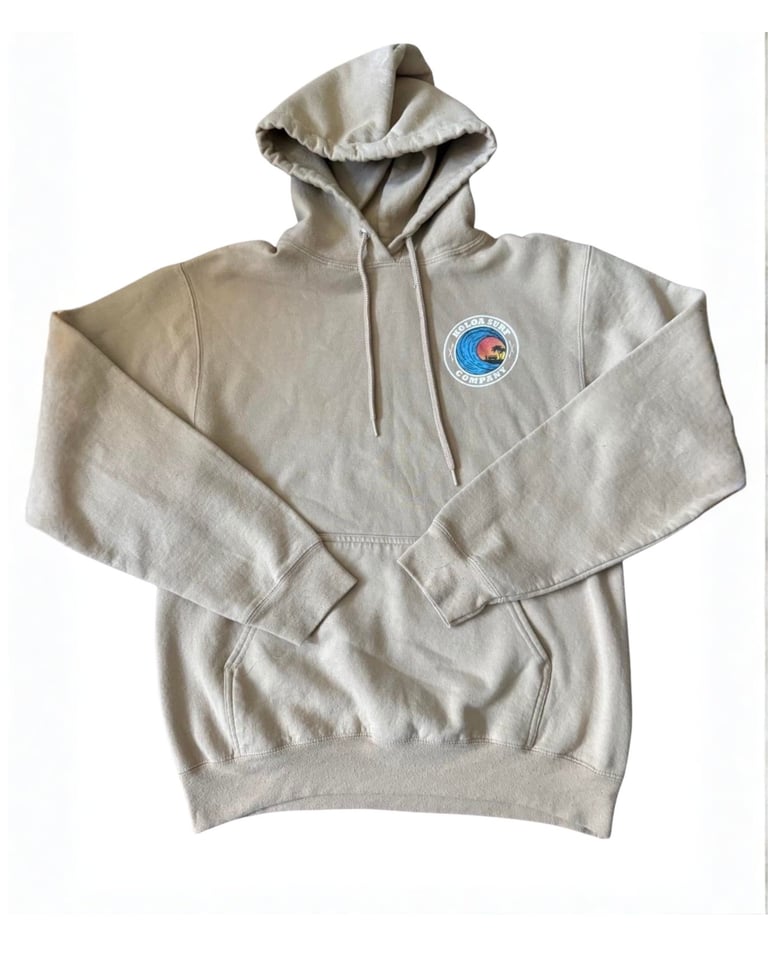 Beige hoodie with a blue circular logo on the chest