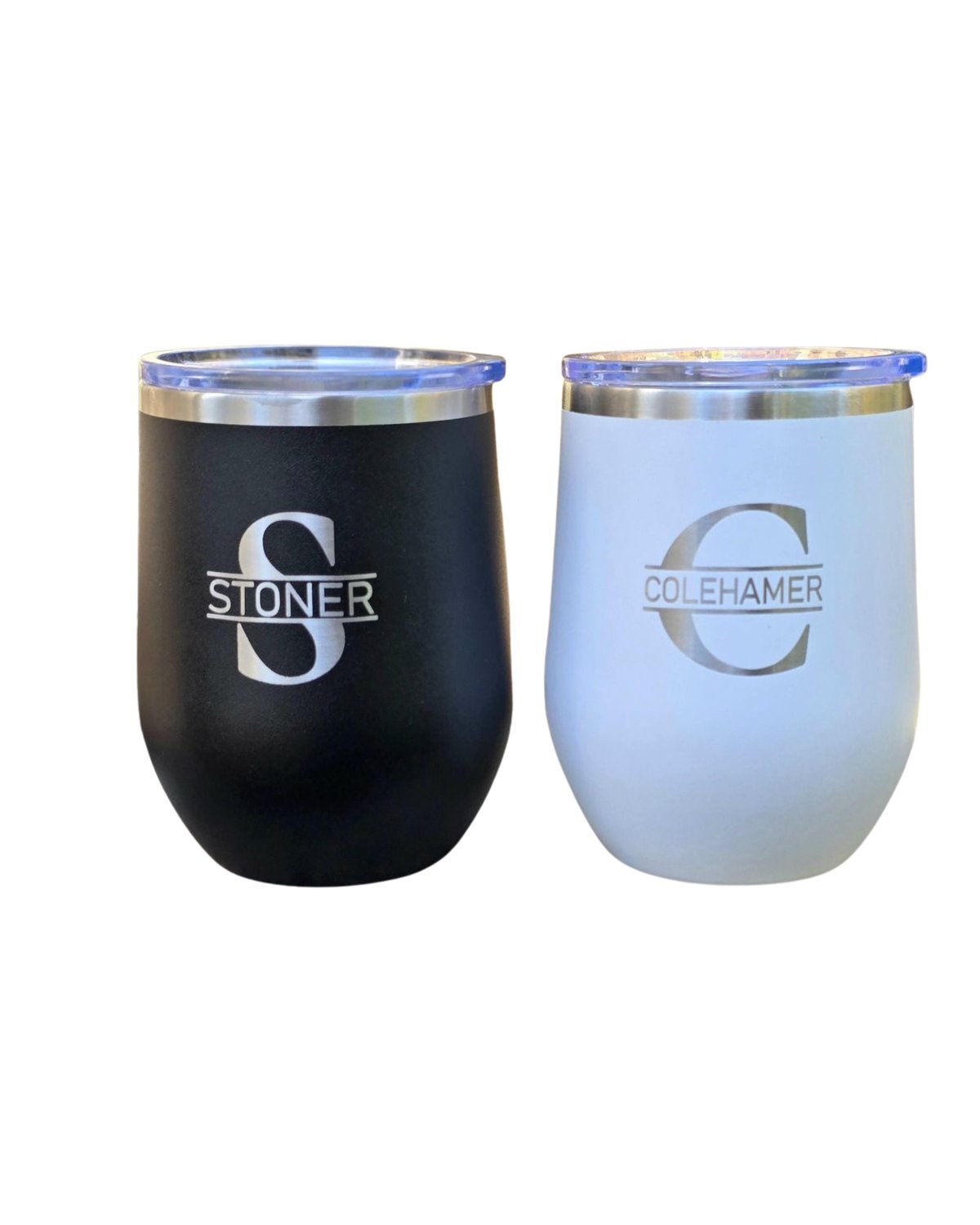 Two insulated wine tumblers with lids - black Stoner and light blue Colehamer branded cups side by side