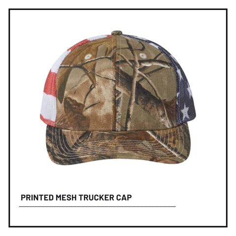 Printed mesh trucker cap with camouflage front panel and red, white, and blue mesh back panels