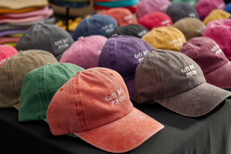 Collection of colorful custom embroidered baseball caps