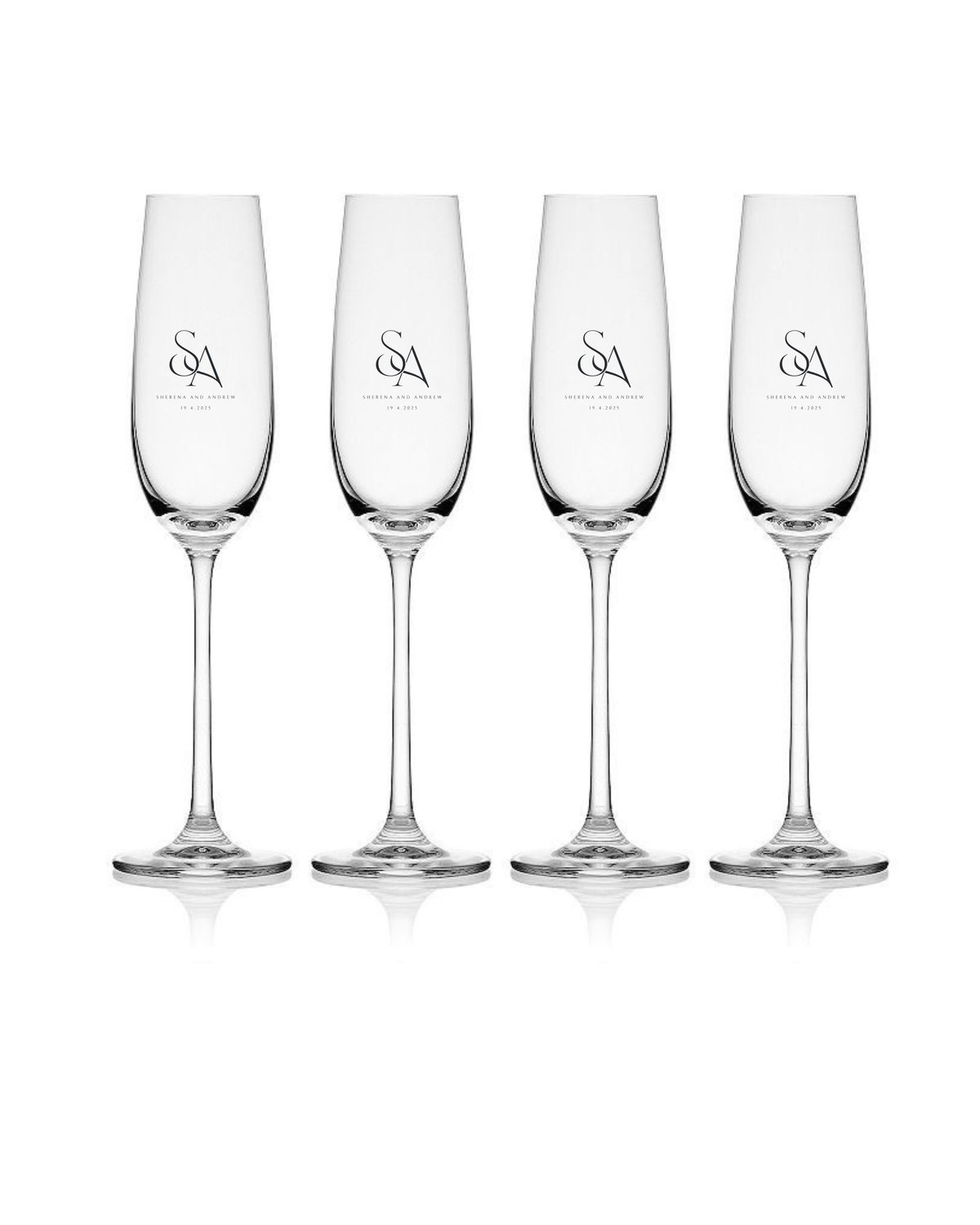 Set of four clear champagne flutes with engraved logo on each glass