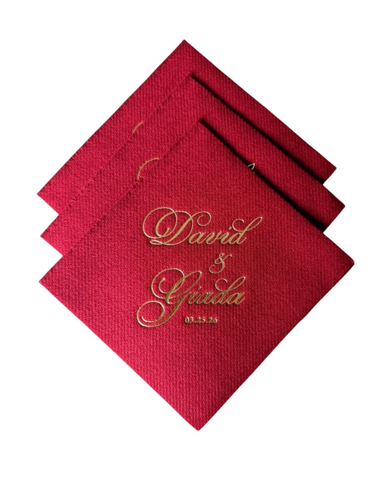Red personalized wedding napkins with gold embroidered names David and Guida and date 06.14.19