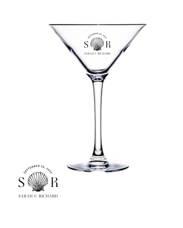 Empty martini glass with wedding monogram logo