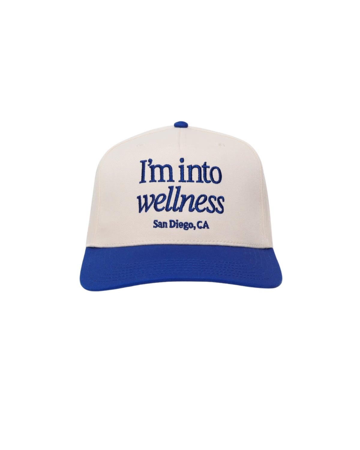 Cream and blue baseball cap with Im into wellness text and San Diego, CA printed on front